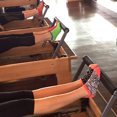 "Client doing foot mobility exercise at Performance Pilates Sugar Land"