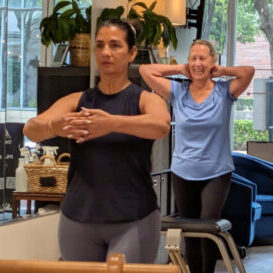 Woman doing Pilates "Chair" Class at Performance Pilates Sugar Land